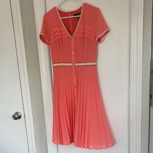 Elegant Coral Pleated Midi Dress by Nissa